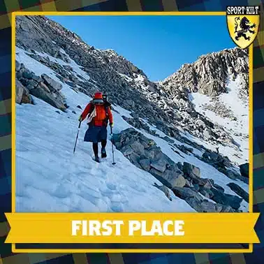 Linda West hiking in Sierra snow 1st place